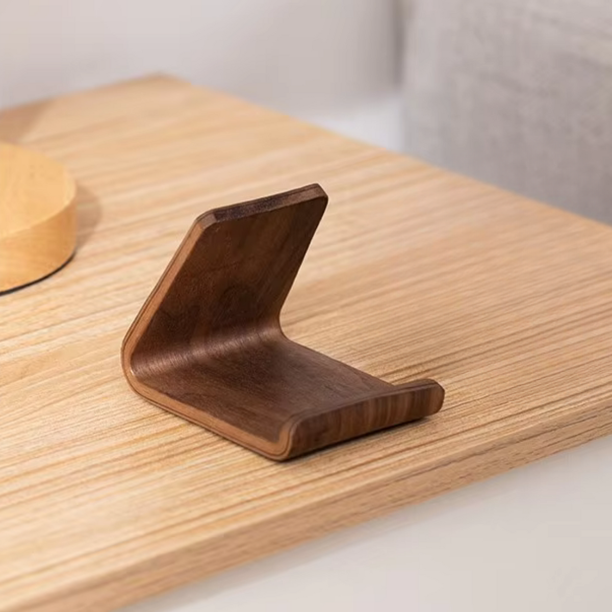 Ayahly walnut wooden stand for a Quran speaker magnet on a wooden surface