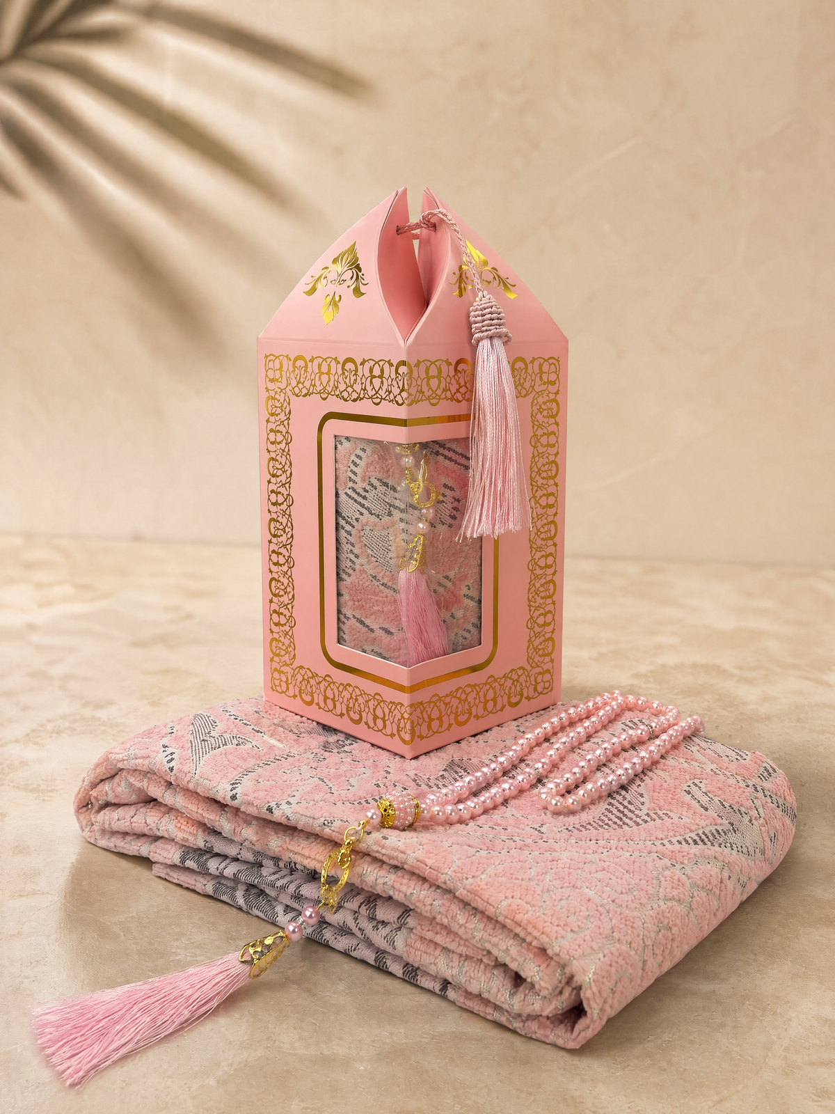 Pink prayer mat and tasbih gift set with a lantern-shaped gift box and matching tassel
