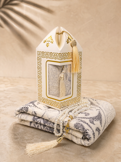 Cream white prayer mat and tasbih gift set with a lantern-shaped gift box and matching tassel